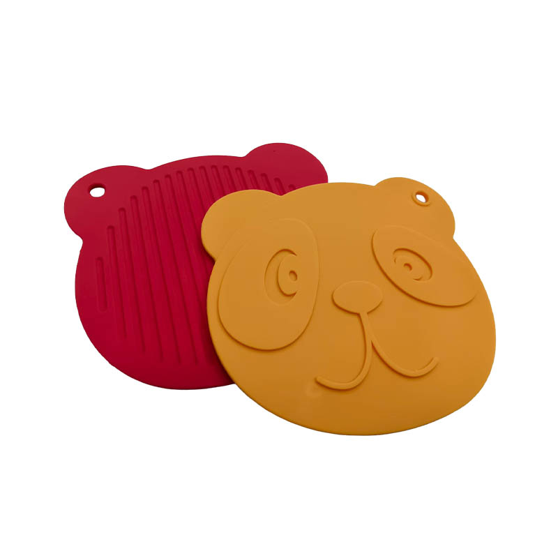 Will the insulation pad remain stable or melt when placed near an electric kettle, rice cooker, or heater?